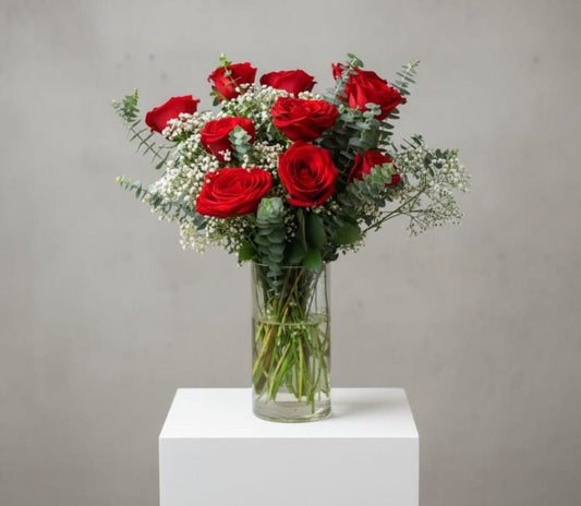 Red rose with white baby breath in vases